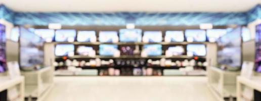 loja de departamentos eletrônicos mostra tv de televisão e eletrodomésticos fundo desfocado foto