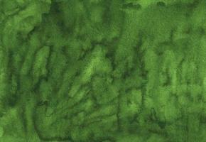 textura de fundo de cor verde aquarela. pano de fundo líquido mostarda verde. manchas no papel. foto