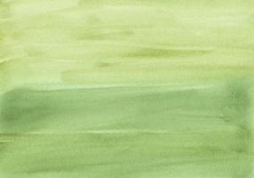 textura de fundo de cor verde mostarda em aquarela. pano de fundo abstrato aquarela. manchas no papel. foto