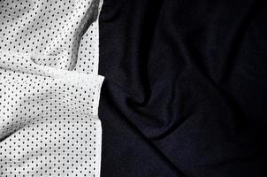 fundo de textura de tecido de roupas esportivas, vista superior da superfície têxtil de pano branco foto