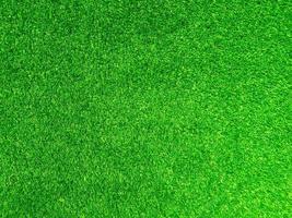 uso de textura de grama verde como pano de fundo natural. papel de parede para arte de design foto