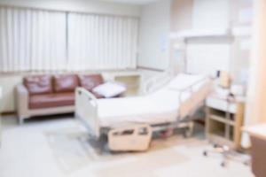 Resumo borrão interior do quarto de hospital com cama médica para plano de fundo foto
