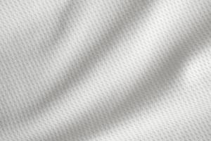 roupas esportivas brancas tecido jersey camisa de futebol textura vista de cima close-up foto