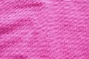 fundo de closeup de textura de tecido de algodão rosa foto