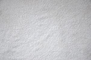 textura de fundo de toalha de algodão natural branco sem dobras foto