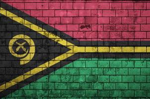 bandeira de vanuatu é pintada em uma parede de tijolos antigos foto