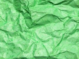 padrão de fundo de textura de papel amassado verde. foto