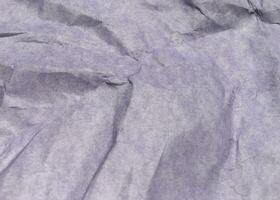 fundo de textura de papel amassado roxo moderno abstrato. foto