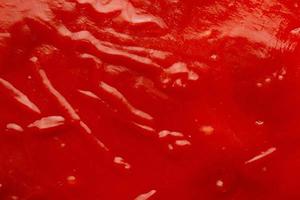 fundo de textura de ketchup de molho de tomate close-up foto
