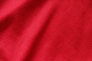 vermelho roupas esportivas tecido camisa de futebol jersey textura fechar foto