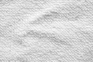 closeup fundo abstrato de textura de toalha de algodão branco foto