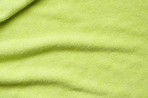 superfície de textura de tecido de toalha verde fechar fundo foto