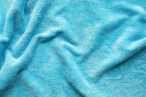 superfície de textura de tecido de toalha azul fechar fundo foto