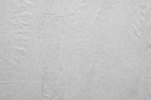 fundo de textura de cartaz de papel amassado e amassado branco em branco foto