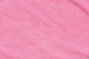 superfície de textura de tecido de toalha rosa fechar fundo foto