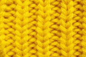 fundo de textura de lã de tricô amarelo foto