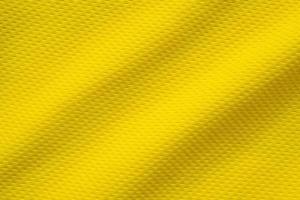 amarelo roupas esportivas tecido camisa de futebol jersey textura fechar foto
