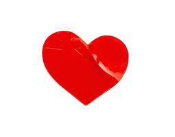 adesivo de forma de coração vermelho isolado no fundo branco foto