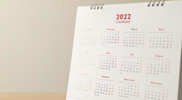 fechar as datas da página do calendário 2022 e o conceito de reunião de planejamento de negócios de plano de fundo do mês foto