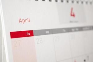 página do calendário de abril com meses e datas conceito de reunião de compromisso de planejamento de negócios foto