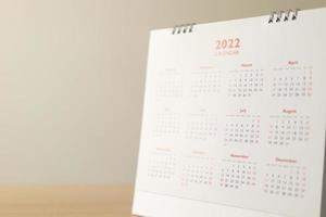 fechar as datas da página do calendário 2022 e o conceito de reunião de planejamento de negócios de plano de fundo do mês foto