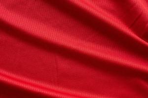 roupas esportivas tecido camisa de futebol textura vista superior cor vermelha foto