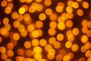 abstrato borrão dourado bokeh luz fundo de férias de natal foto