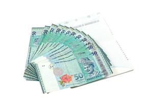 moeda da Malásia em fundo branco foto