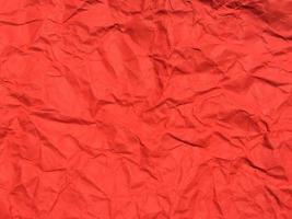 fundo de textura de papel amassado vermelho para design. papel de parede para espaço de cópia foto