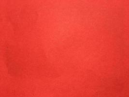 textura de papel vermelho para segundo plano. padrão de papel de parede para design foto