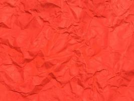 fundo de textura de papel amassado vermelho para design. papel de parede para espaço de cópia foto