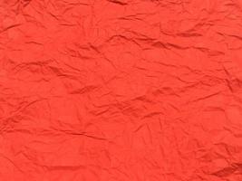 fundo de textura de papel amassado vermelho para design. papel de parede para espaço de cópia foto