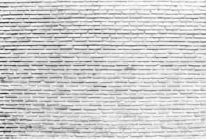 bloco de parede de tijolo branco claro velho e rachado para segundo plano, espaço de cópia de textura foto