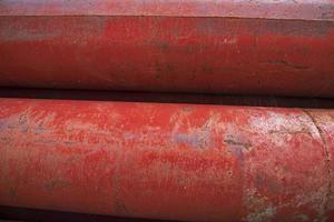 tubos de metal de aço de ferro enferrujado podem ser usados como um fundo de textura industrial foto