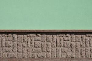 textura horizontal da base de pedra de granito de mosaico grosso e forte foto