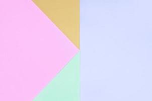 fundo de textura de cores pastel da moda. papéis de padrão geométrico rosa, violeta, laranja e azul. foto