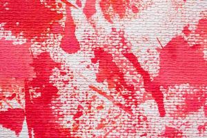 textura de fundo de papel de tinta aquarela vermelha abstrata foto