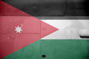 bandeira da Jordânia retratada na parte lateral do helicóptero blindado militar closeup. fundo conceitual de aeronaves de forças do exército foto