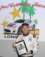 los angeles, 11 de abril - brett davern, vencedor da pole com tempo de qualificação mais rápido para as celebridades no dia de qualificação pro celeb race 2014 em long beach grand prix em 11 de abril de 2014 em long beach, ca foto