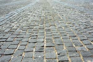 pavimento de paralelepípedos cinza velho, praças pavimentadas, pedras planas foto