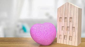 a madeira em casa e o coração rosa para renderização em 3d do conceito de propriedade foto