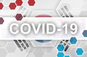 bandeira da coreia do sul e composição abstrata digital futurista com inscrição covid-19. conceito de surto de coronavírus foto