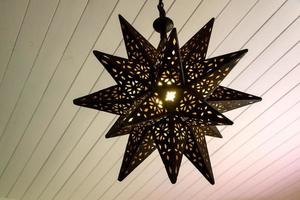 lâmpada enferrujada em forma de estrela foto