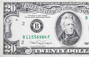 retrato do presidente americano andrew jackson no fragmento macro de closeup de notas de 20 dólares foto