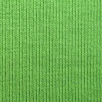 a textura do tecido é verde brilhante. material para fazer camisas e blusas foto