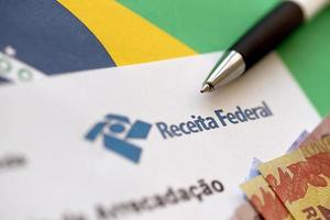 ternopil, ucrânia - 20 de maio de 2022 comprovante de arrecadação - comprovante de relatório de cobrança com logomarca federal da receita brasileira. receita federal é a Receita Federal do Brasil foto