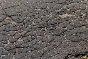 pavimento de asfalto danificado, close-up foto