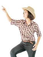 jovem com um chapéu de cowboy e camisa xadrez foto