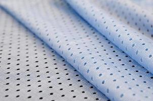 padrão de fundo têxtil de tecido de malha azul esporte desgaste foto