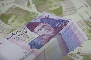 pacote de notas de mistura de moeda paquistanesa foto